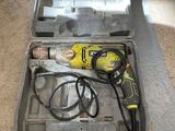 a tool in a tool box on the floor