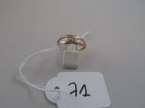 a tag that has a ring on it with a price tag