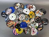 a lot of dvds that are sitting on a table