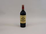 a bottle of wine that is sitting on a table