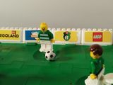 legos that are playing a game of soccer