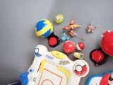 a table with toys on it and a toy basketball game