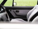 a view of the inside of a car from the driver ' s seat
