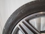 a close up of a tire on a car with a white background