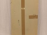 a cardboard box sitting on top of a white table