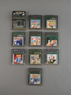 beaucoup de cartouches de jeux Nintendo accrochées au mur
