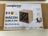 a cardboard box with a bunch of wine bottles inside of it