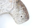 a statue of a fish that is sitting on top of a table