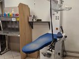 a room with a chair and a table in it