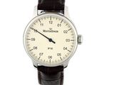 une image d'un gros plan d'une montre-bracelet sur un fond blanc