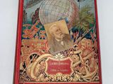 un vieux livre dont la couverture représente un homme à l'intérieur d'un globe terrestre