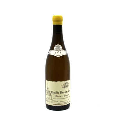 a bottle of wine that is sitting on a table
