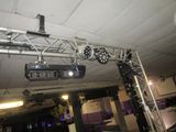 a lot of lights that are hanging from the ceiling