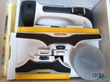 a box that has a knife, knife sharper, and other items in it