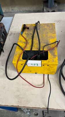 a yellow box that has some wires attached to it