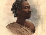 une vieille photo d'un homme avec des dreadlocks sur la tête