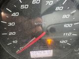 a close up of a speedometer in a car