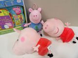three pep the pig plush toys sitting next to each other