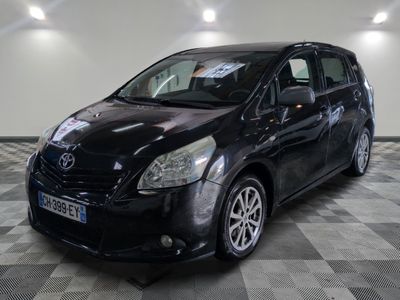 a picture of a black toyota sienna parked in a garage
