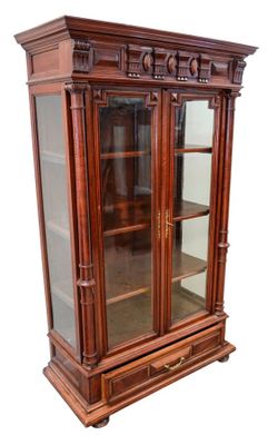 an image of a wooden display cabinet with glass doors and drawers