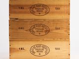 three wooden boxes that are stacked on top of each other