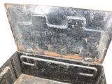 a black box that has a metal lid on it