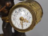 a clock that is sitting on top of a table