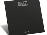black digital bathroom scale with the time displayed on the display