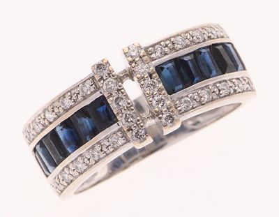 BAGUE ouverte en or gris 750 °/°° sertie d'un pavage de diam…