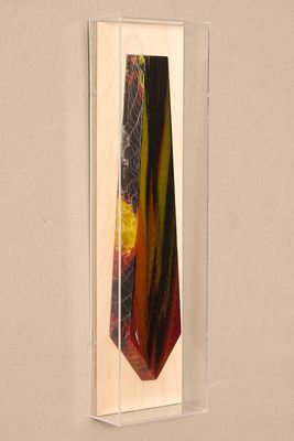 a picture of a tie hanging on a wall