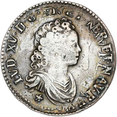 une pièce d'argent représentant une femme
