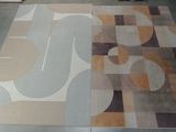a picture of a room with a rug on the floor and a rug on the floor