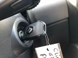 a car door handle with a car key attached to it
