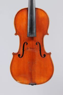 an old violin with a bow on a white background