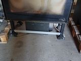 a television that is sitting on a stand in a room