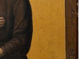 an old painting of a man in a black coat holding a book