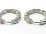 pair of silver and opalite hoop earrings on white background
