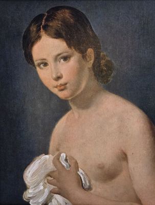 portrait of a young boy with a towel by person