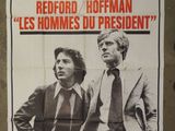 poster of two men standing next to each other in front of a wall