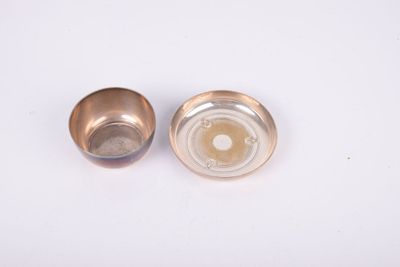 pair of silver plated ashtrays on a white background