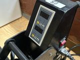 a machine that is sitting on a table in a room