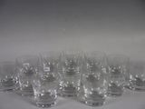 a lot of empty glasses sitting on a table
