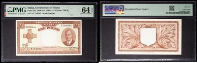 three different types of currency are on display in a display case