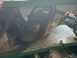 a picture of a workbench with a chainsaw and other tools