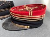 two hats that are sitting on a table