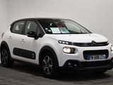 a white citrole is parked in a white room