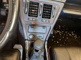 dashboard of a car with dirt all over the dash