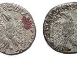 four different types of coins are shown on a white background