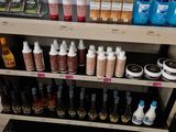 a display of cosmetics products on a shelf in a store