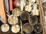a box full of silverware sitting on a table